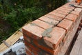 Bricklaying photo. Bricklaying Tips. How to build a brick wall. Royalty Free Stock Photo