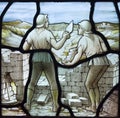 Bricklaying in a stained glass window