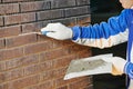 Bricklaying Using the Brick Jointer Trowel Royalty Free Stock Photo