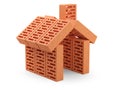 The bricks are arranged in the shape of the house. Building koncept. Royalty Free Stock Photo