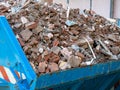 Bricks in a construction waste container Royalty Free Stock Photo