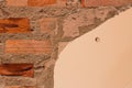 The broken wall shown bricks pattern and cement Royalty Free Stock Photo