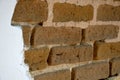 Are bricks made of unfired clay and also the two product names refer to buildings made of this material. brick, with buildings of