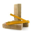 Bricks and measurement tool Royalty Free Stock Photo