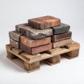 Stacked bricks on wooden pallet construction materials Royalty Free Stock Photo