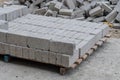 Bricks stacked on wooden pallet