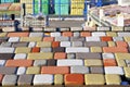 Bricks and tiles of pavement at construction site. Warehouse paving slabs for laying road.