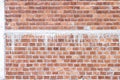 Bricks wall background decorative on concrete with stain in seamless patterns Royalty Free Stock Photo