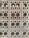 Bricks wall with round holes abstract