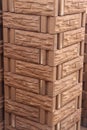 The bricks are arranged alternately to form columns.