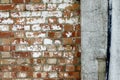 Brickstone And Concrete Wall With Black Waterpipe Detail