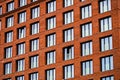 Brickwork facade of a residential building in the loft style. Royalty Free Stock Photo