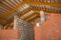 Brickwork inside the building. Construction of walls of red brick and cement blocks