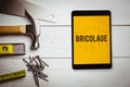 Bricolage against blueprint Royalty Free Stock Photo