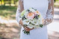 Boquet of flowers in bride hand Royalty Free Stock Photo