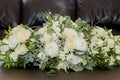 Bridal bouquet. The bride`s bouquet. Beautiful bouquet of white, blue, pink flowers and greenery, decorated with long silk ribbon Royalty Free Stock Photo