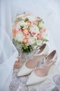 Bridal bouquet, bride shoes and earings on chair, copy space. Luxury wedding accessories and jewelry. Wedding concept. Royalty Free Stock Photo