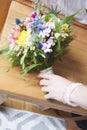 Bridal bouquet with hand of bride