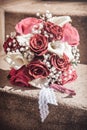 Bridal bouquet with red, pink and white roses and white callas Royalty Free Stock Photo