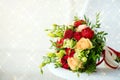 Bridal bouquet of red roses, with red satin ribbons