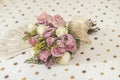 Bridal bouquet of roses with a Spanish hand fan