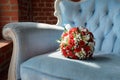 Bridal bouquet in soft antique chair