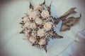 Bridal bouquet on the weddind dress