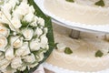 Bridal bouquet and wedding cake Royalty Free Stock Photo