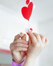 Bridal Couple showing wedding rings. Wife and husband interlacing hands