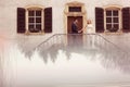 Bridal couple on stairs of their house