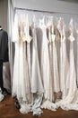 Bridal dresses on hangers during the Allure Bridal Spring 2020 fashion presentation