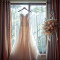 Bridal elegance Wedding dress hangs on a curtain rail near window