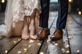 Bridal and grooms feet meet, adorned in elegant wedding shoes, a timeless union