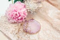 Bridal hair jewelry made of crystals and rhinestones, pink peony flower and lace, delicate wedding background Royalty Free Stock Photo