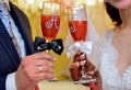 Bridal hands with juice cups. Bride`s hand is tattooed with henna. Traditional Moroccan wedding Royalty Free Stock Photo