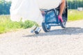 Bridal pair driving motor scooter wearing gown and suit Royalty Free Stock Photo