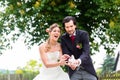 Bridal pair with flying white doves at wedding