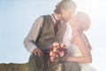 Bridal pair kissing after wedding Royalty Free Stock Photo