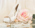 bridal rose with wedding shoe and beads Royalty Free Stock Photo