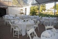 Photo of the wedding reception tent table settings. Royalty Free Stock Photo