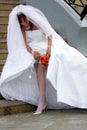 Bride adjusting garter