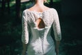 Bride back in forest Royalty Free Stock Photo