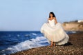 Bride on a beach in Santorini Royalty Free Stock Photo