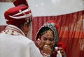 Bride being fed ladoo(sweet) Royalty Free Stock Photo