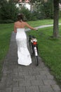 Bride on a bike Royalty Free Stock Photo