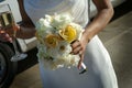 Bride with bouquet and champagne