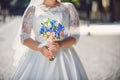 Bride with Bouquet in Street