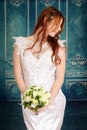 Bride with braids and flower bouquet Royalty Free Stock Photo