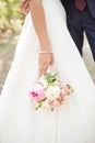 Bride. Bridal bouquet. Bride holding a bouquet. Wedding photo concept.