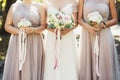 Bride and bridesmaids with autumn bouquets Royalty Free Stock Photo